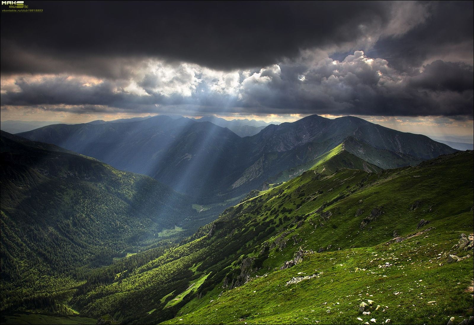 mountains-sky-clouds-sunlight-wallpaper.jpg